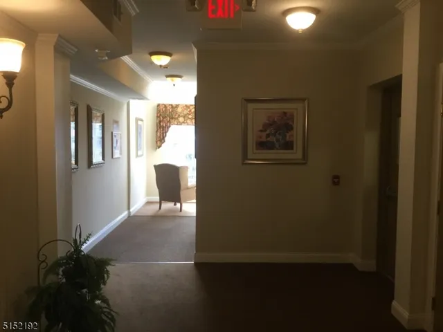 a workspace with furniture and a window