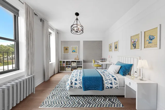 a living room with furniture a rug and a window