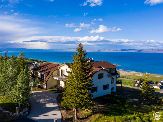 588 Raspberry Patch Road Garden City, UT 84028 - Photo 65 of 74 Aerial view of property and surrounding area featuring a nearby body of water