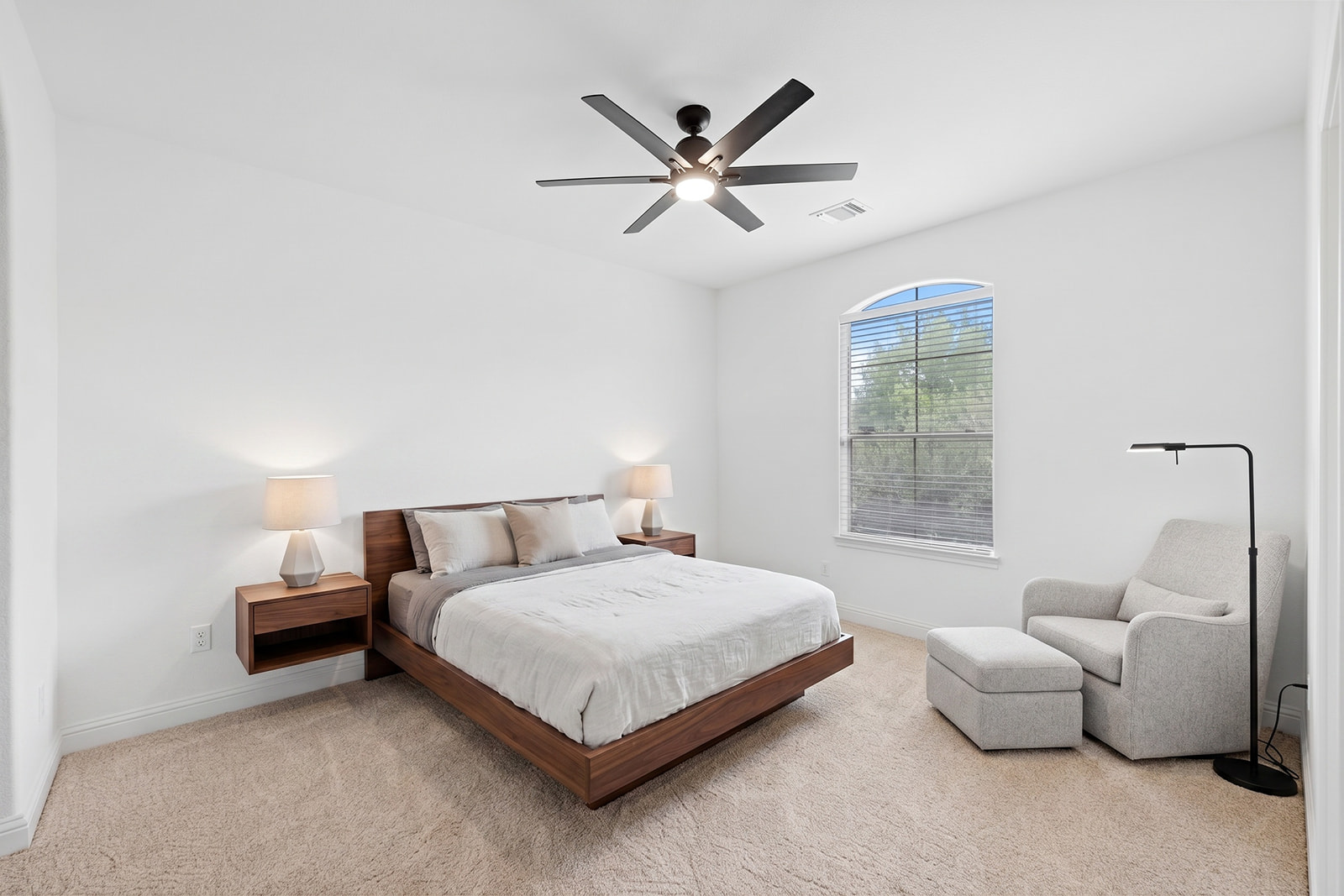 114 North Saddle Ridge Drive Cedar Park, TX 78613 - Photo 27 of 40 a bedroom with a bed and a couch