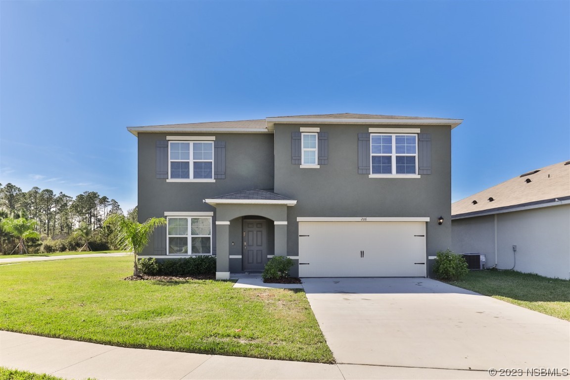 a front view of house with yard