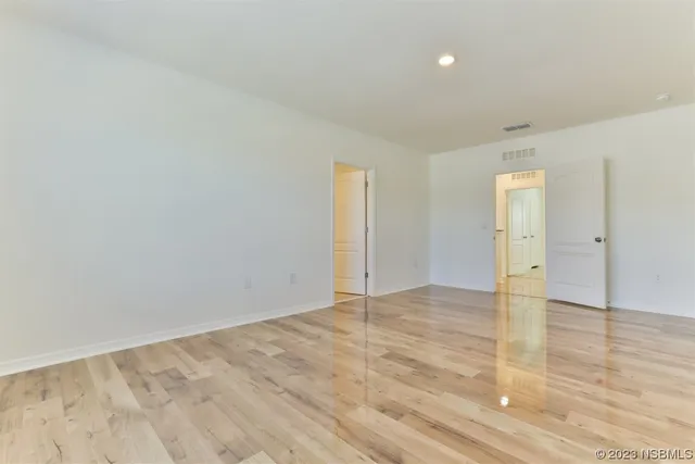 a view of a room that has a window in it