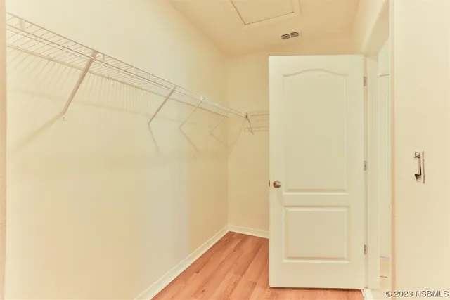 a bathroom with a toilet and a bathtub
