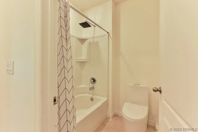 an aerial view of residential building with outdoor space