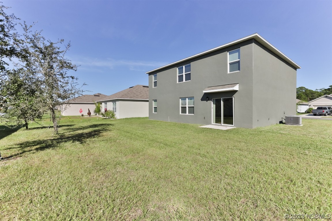 206 Old Mill Edgewater, FL 32141 - Photo 50 of 66 a front view of a house with a yard
