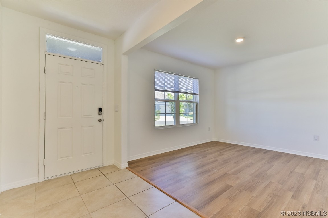 206 Old Mill Edgewater, FL 32141 - Photo 5 of 66 an empty room with windows
