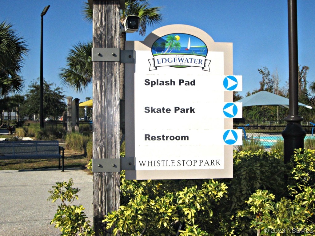 206 Old Mill Edgewater, FL 32141 - Photo 63 of 66 a sign on the side of a building