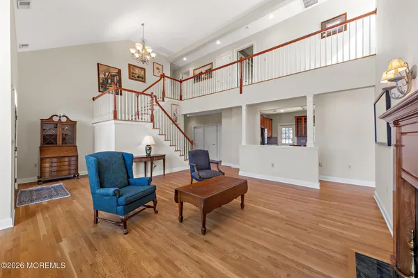 a view of room with furniture and windows
