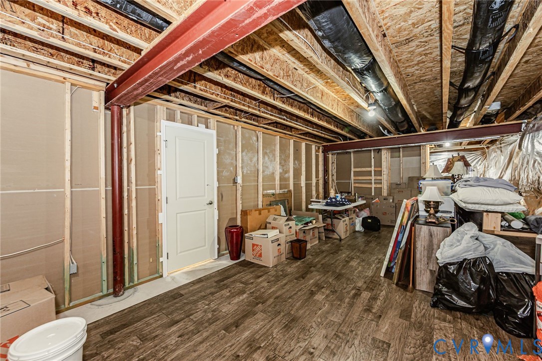 7435 Wicks Road Williamsburg, VA 23188 - Photo 75 of 82 Unfinished basement area featuring wood-finish flo