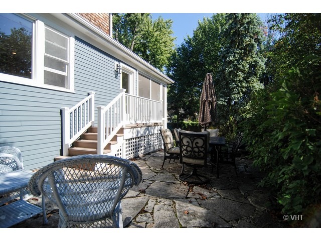 187 Ridge Avenue Winnetka, IL 60093 - Photo 14 of 18 a view of backyard with barbeque grill and outdoor seating