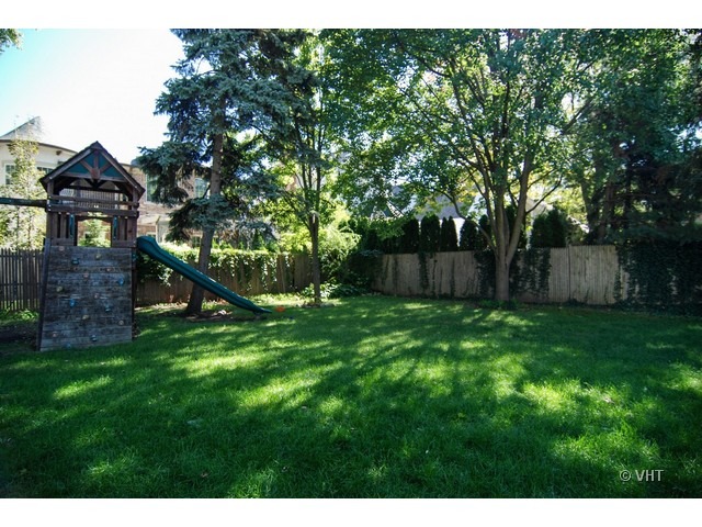 187 Ridge Avenue Winnetka, IL 60093 - Photo 15 of 18 a view of a house with a back yard
