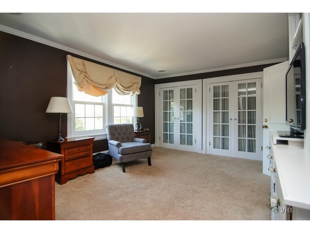187 Ridge Avenue Winnetka, IL 60093 - Photo 8 of 18 a living room with furniture and a large window