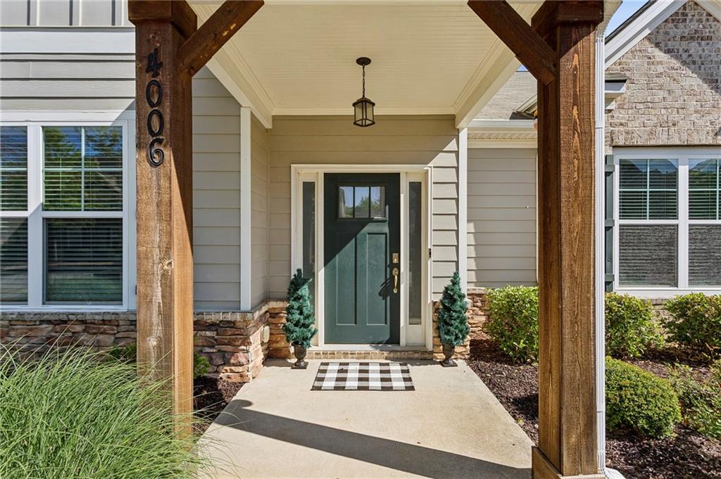 4006 Glendianne Way Powder Springs, GA 30127 - Photo 2 of 21 a view of a door and chair in the house front of house