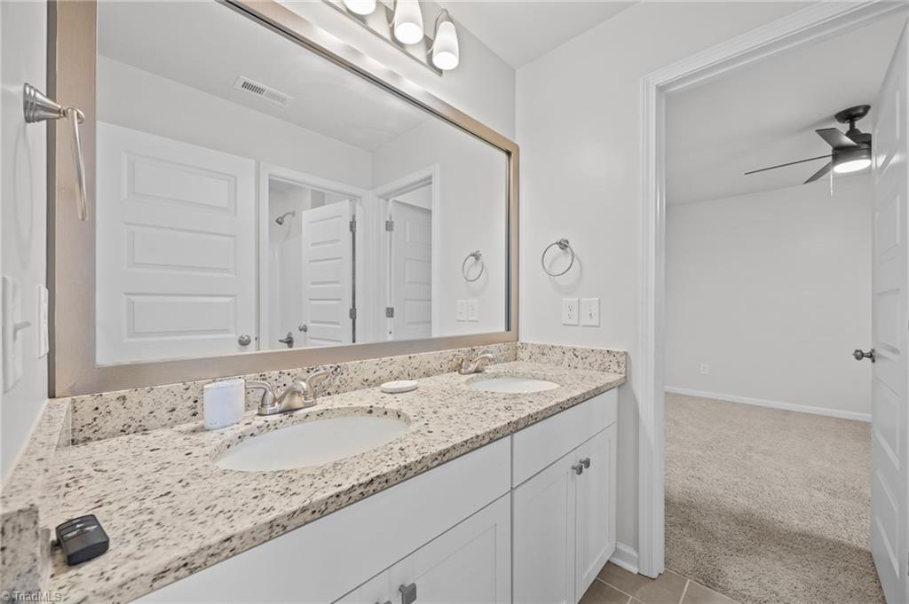 1976 Channel Street Graham, NC 27253 - Photo 30 of 49 Jack-and-Jill Bathroom