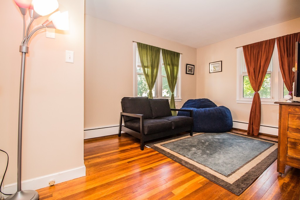 14 Governors Street Worcester, MA 01606 - Photo 15 of 26 a living room with furniture and a window