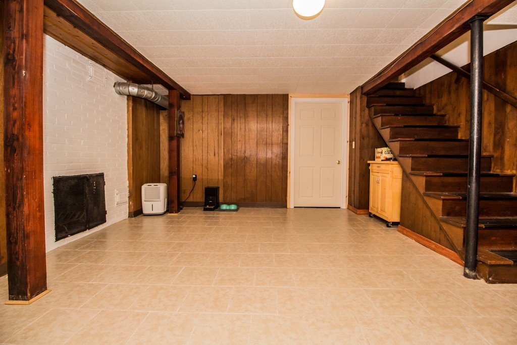 14 Governors Street Worcester, MA 01606 - Photo 25 of 26 a view of an empty room with stairs and a window