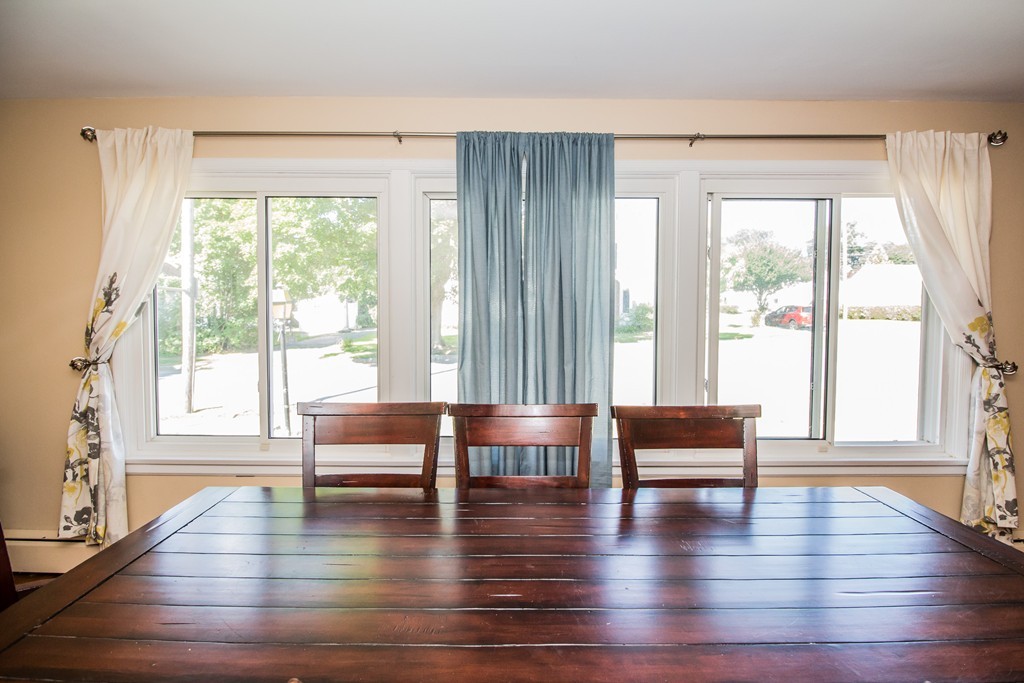 14 Governors Street Worcester, MA 01606 - Photo 8 of 26 a view of an empty room wooden floor and windows