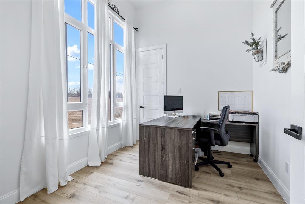 971 Sister Grove Road Van Alstyne, TX 75495 - Photo 14 of 38 a view of a workspace with furniture and a window