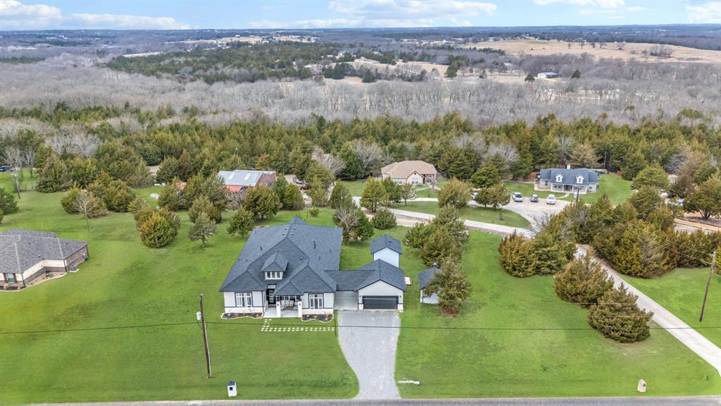 971 Sister Grove Road Van Alstyne, TX 75495 - Photo 35 of 38 an aerial view of a house with a yard