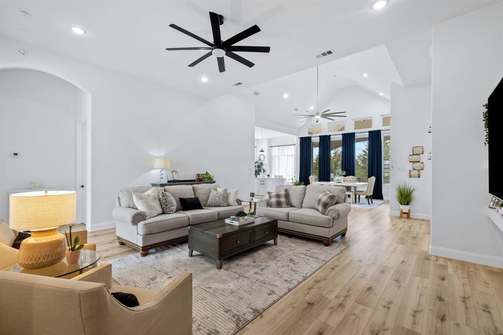 971 Sister Grove Road Van Alstyne, TX 75495 - Photo 7 of 38 a living room with furniture and a large window