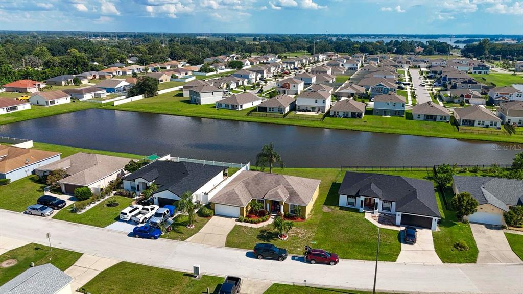 1070 Summer Glen Drive Winter Haven, FL 33880 - Photo 13 of 40 an aerial view of a house with a swimming pool outdoor seating and yard