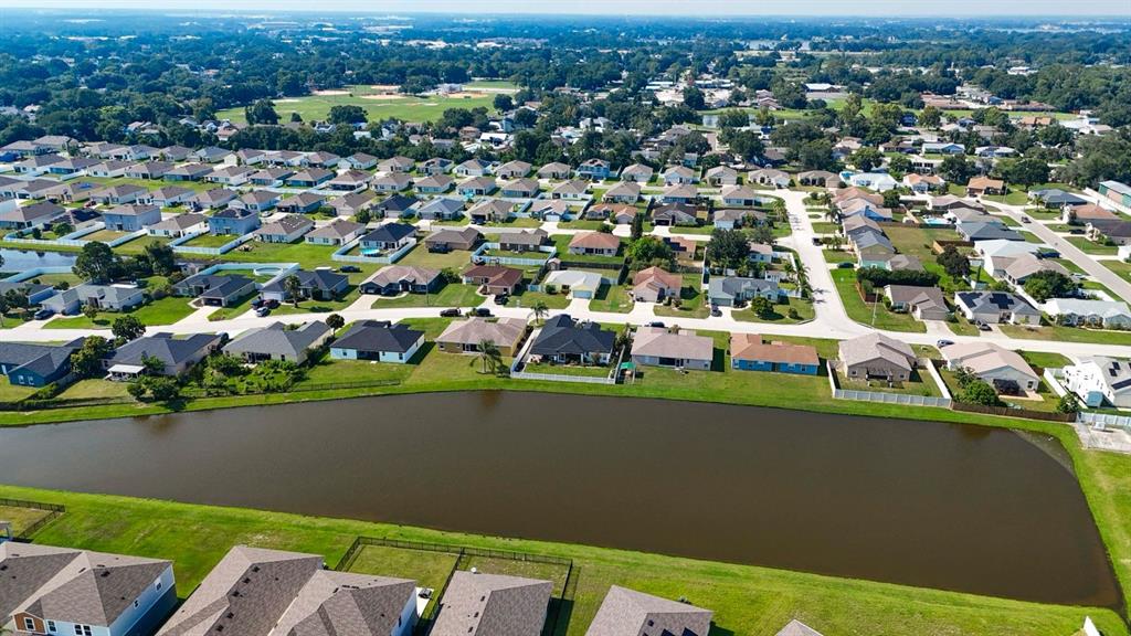 1070 Summer Glen Drive Winter Haven, FL 33880 - Photo 17 of 40 an aerial view of a house with a lake view