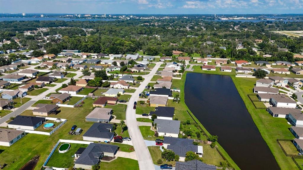 1070 Summer Glen Drive Winter Haven, FL 33880 - Photo 18 of 40 an aerial view of residential houses with outdoor space