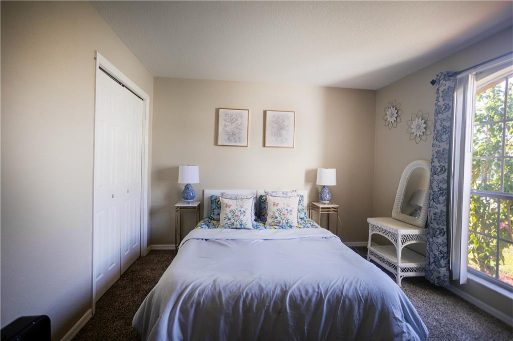 1070 Summer Glen Drive Winter Haven, FL 33880 - Photo 23 of 40 a bedroom with a bed and a large window