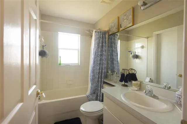 a room with furniture and window