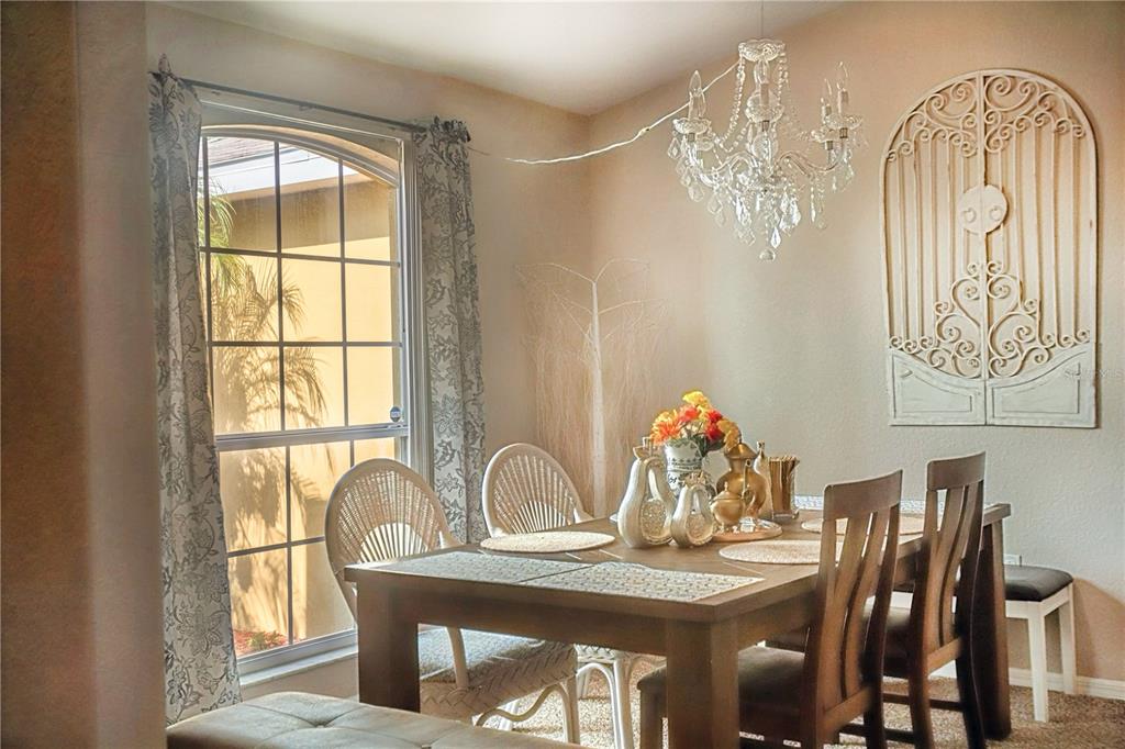 1070 Summer Glen Drive Winter Haven, FL 33880 - Photo 39 of 40 a view of a dining room with furniture window and outside view