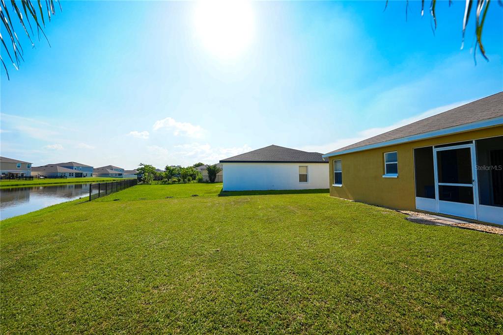 1070 Summer Glen Drive Winter Haven, FL 33880 - Photo 7 of 40 a house view with swimming pool in front of it