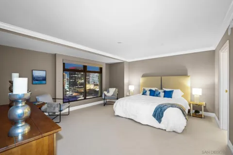 a bedroom with a bed and a fireplace