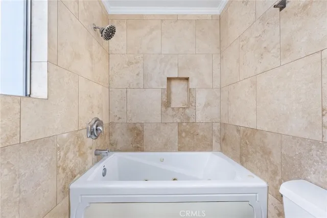 a bathroom with a sink double vanity and shower