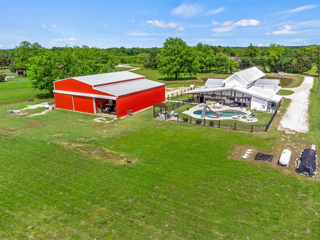 230 County Road Paris, TX 75462 - Photo 1 of 1 Back View of the Airplane Hanger doors