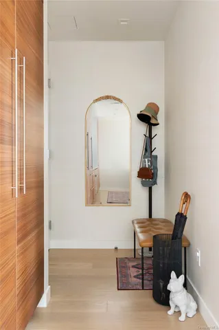 a living room with a rug and a rug