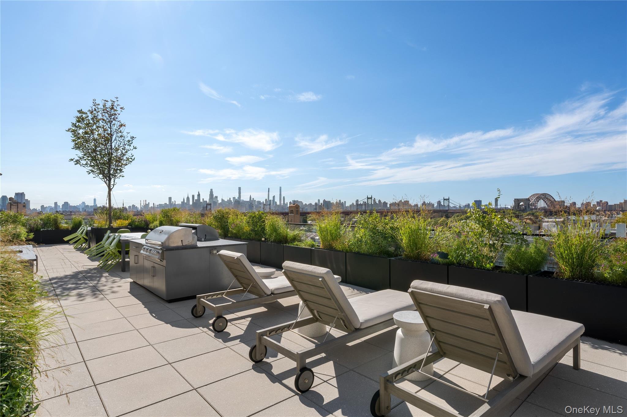 21-21 31st Street, Unit 4E Queens, NY 11105 - Photo 19 of 25 a view of a terrace with furniture