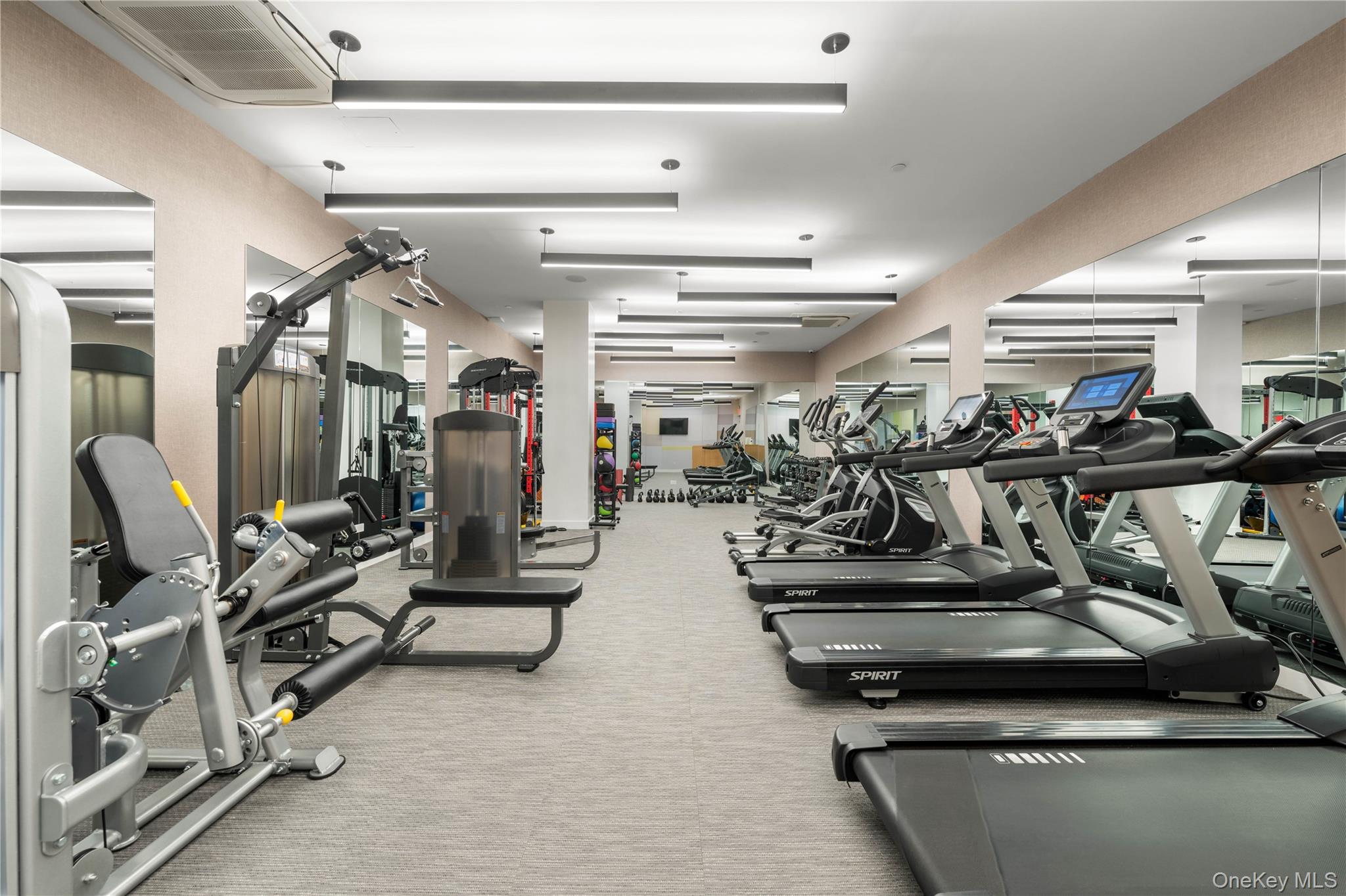 21-21 31st Street, Unit 4E Queens, NY 11105 - Photo 22 of 25 a view of a room with gym equipment