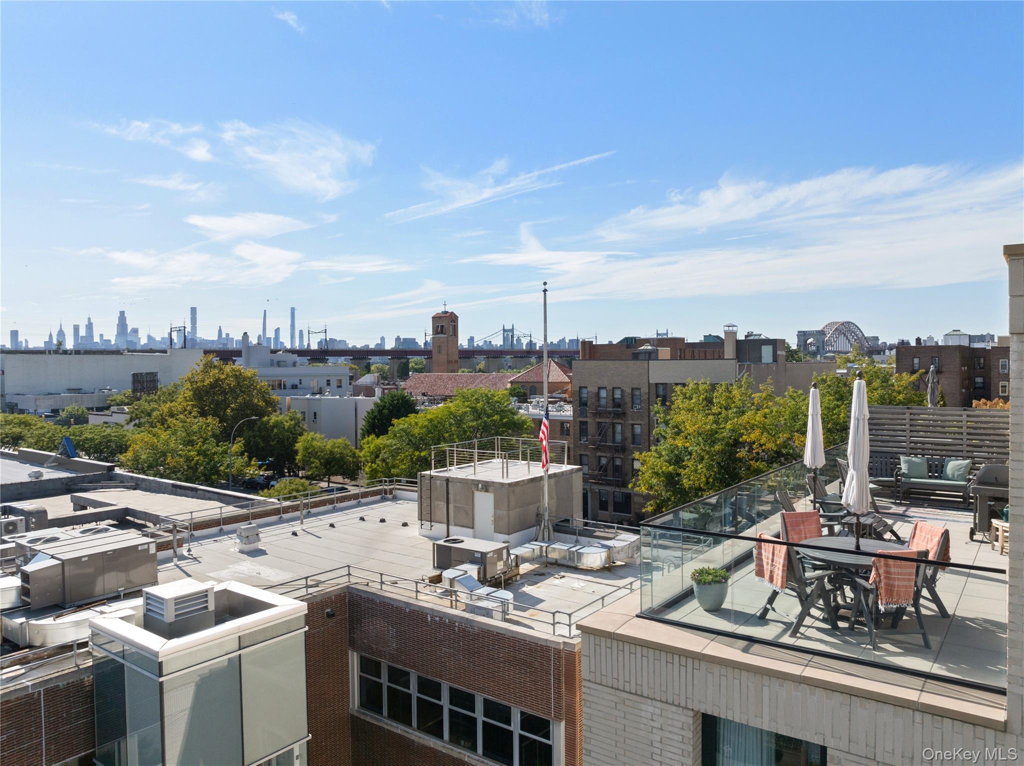 21-21 31st Street, Unit 4E Queens, NY 11105 - Photo 6 of 25 a view of a terrace with furniture