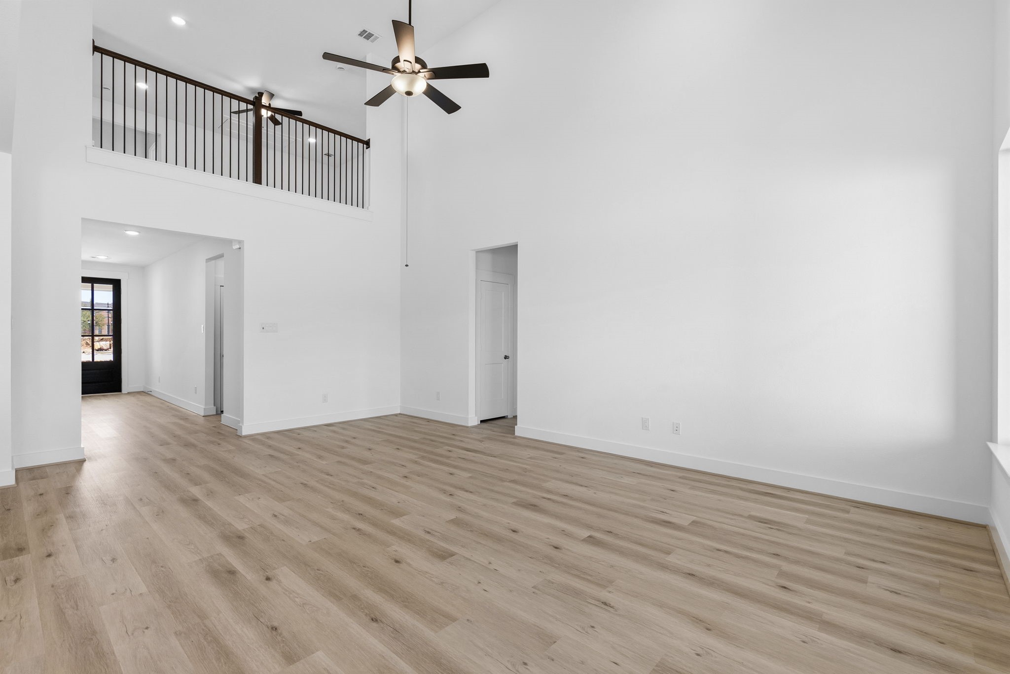 19211 Trinity Terrace Ln Spring Spring, TX 77379 - Photo 17 of 40 a view of empty room with wooden floor
