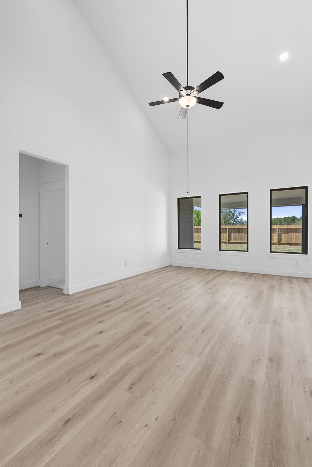 19211 Trinity Terrace Ln Spring Spring, TX 77379 - Photo 18 of 40 a view of an empty room with a window