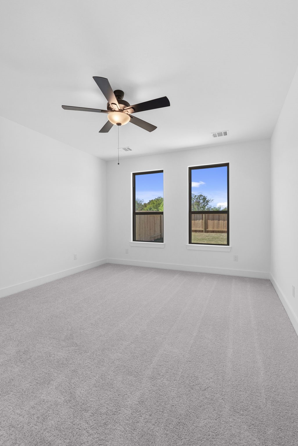 19211 Trinity Terrace Ln Spring Spring, TX 77379 - Photo 20 of 40 a view of a big room with carpet
