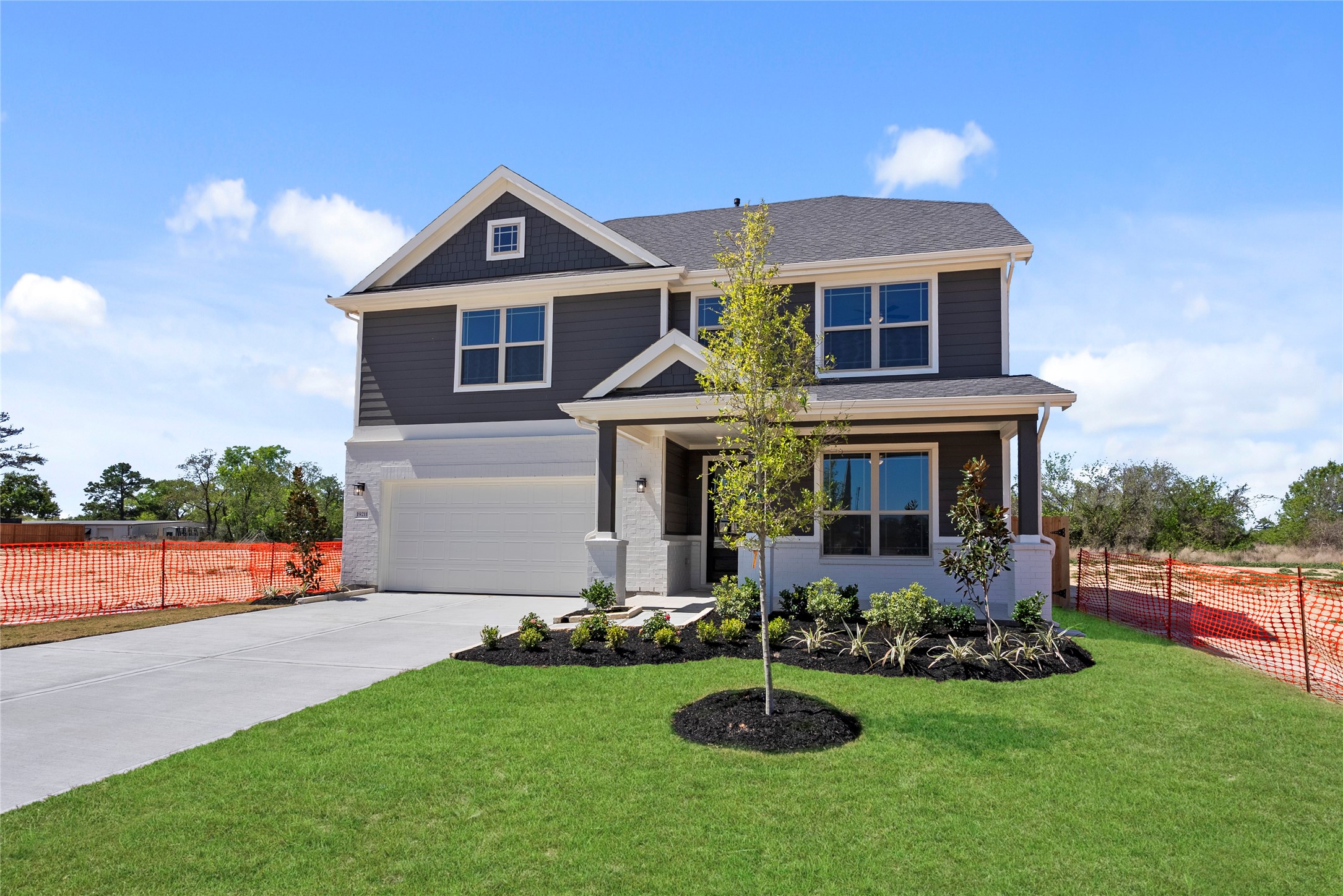 19211 Trinity Terrace Ln Spring Spring, TX 77379 - Photo 2 of 40 a front view of house with yard and green space