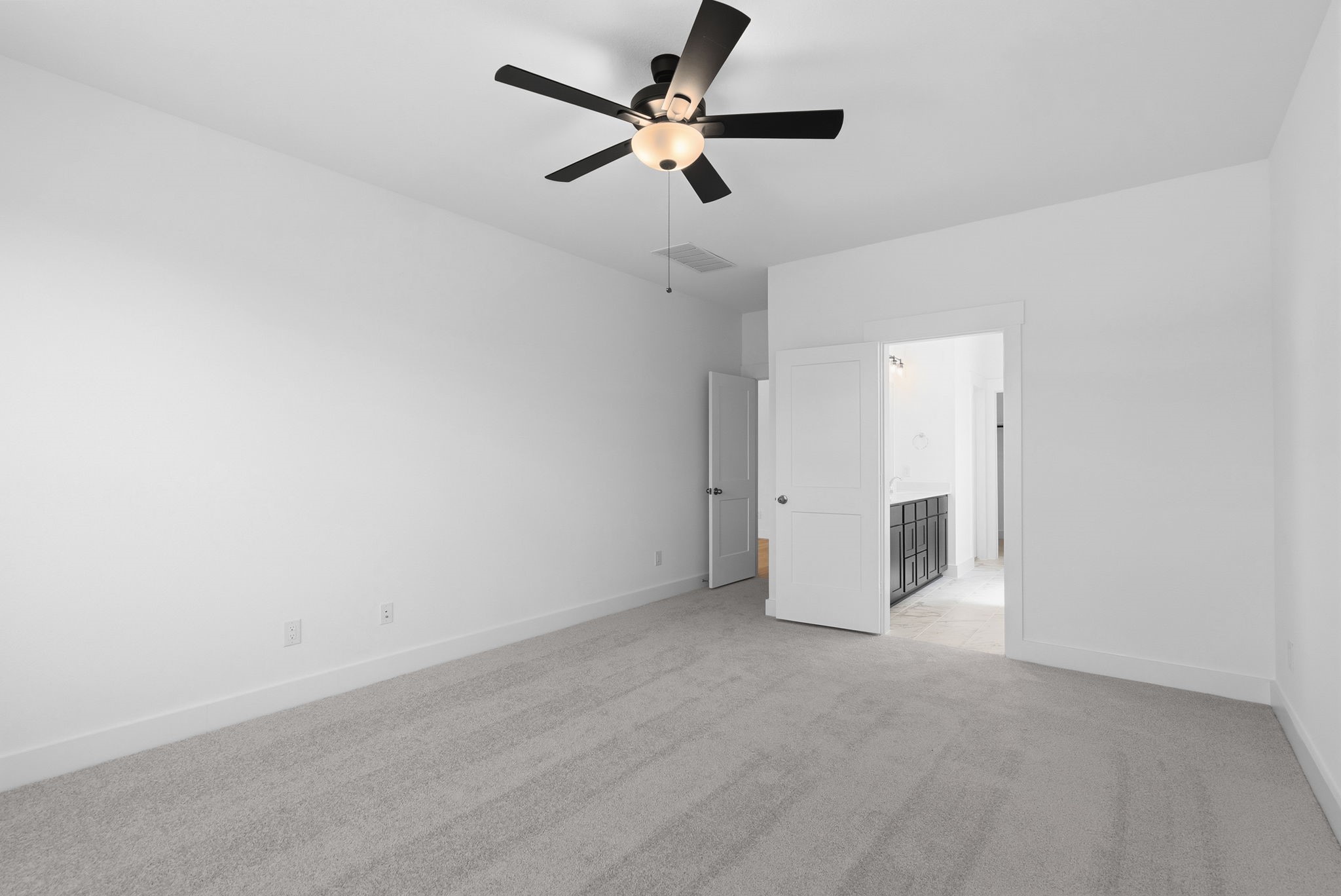 19211 Trinity Terrace Ln Spring Spring, TX 77379 - Photo 23 of 40 an empty room with a ceiling fan and a window