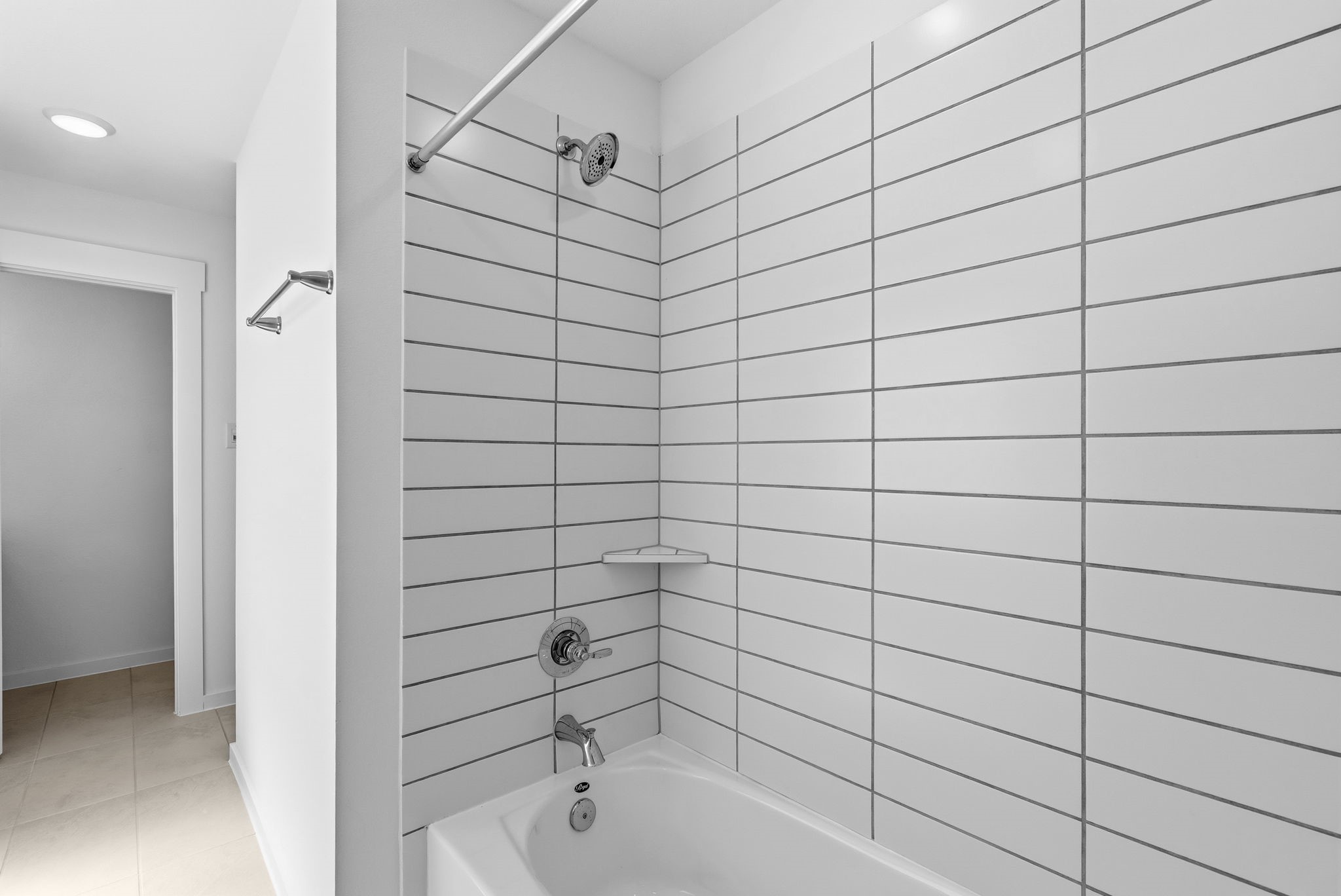 19211 Trinity Terrace Ln Spring Spring, TX 77379 - Photo 29 of 40 a bathroom with a bathtub and shower