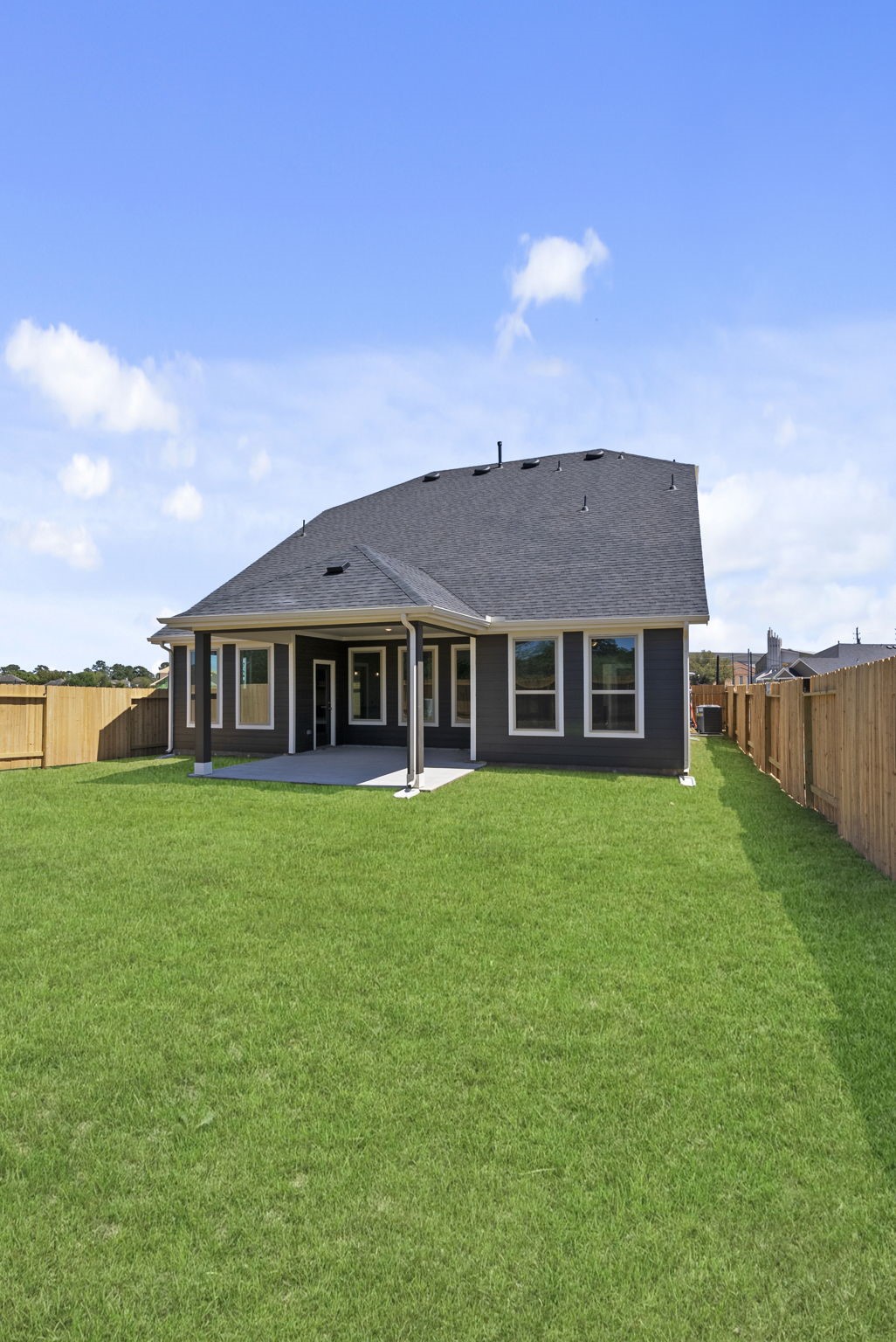 19211 Trinity Terrace Ln Spring Spring, TX 77379 - Photo 34 of 40 a front view of a house with a garden