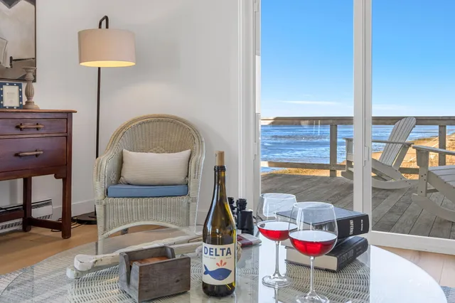 a living room with a couch and a table