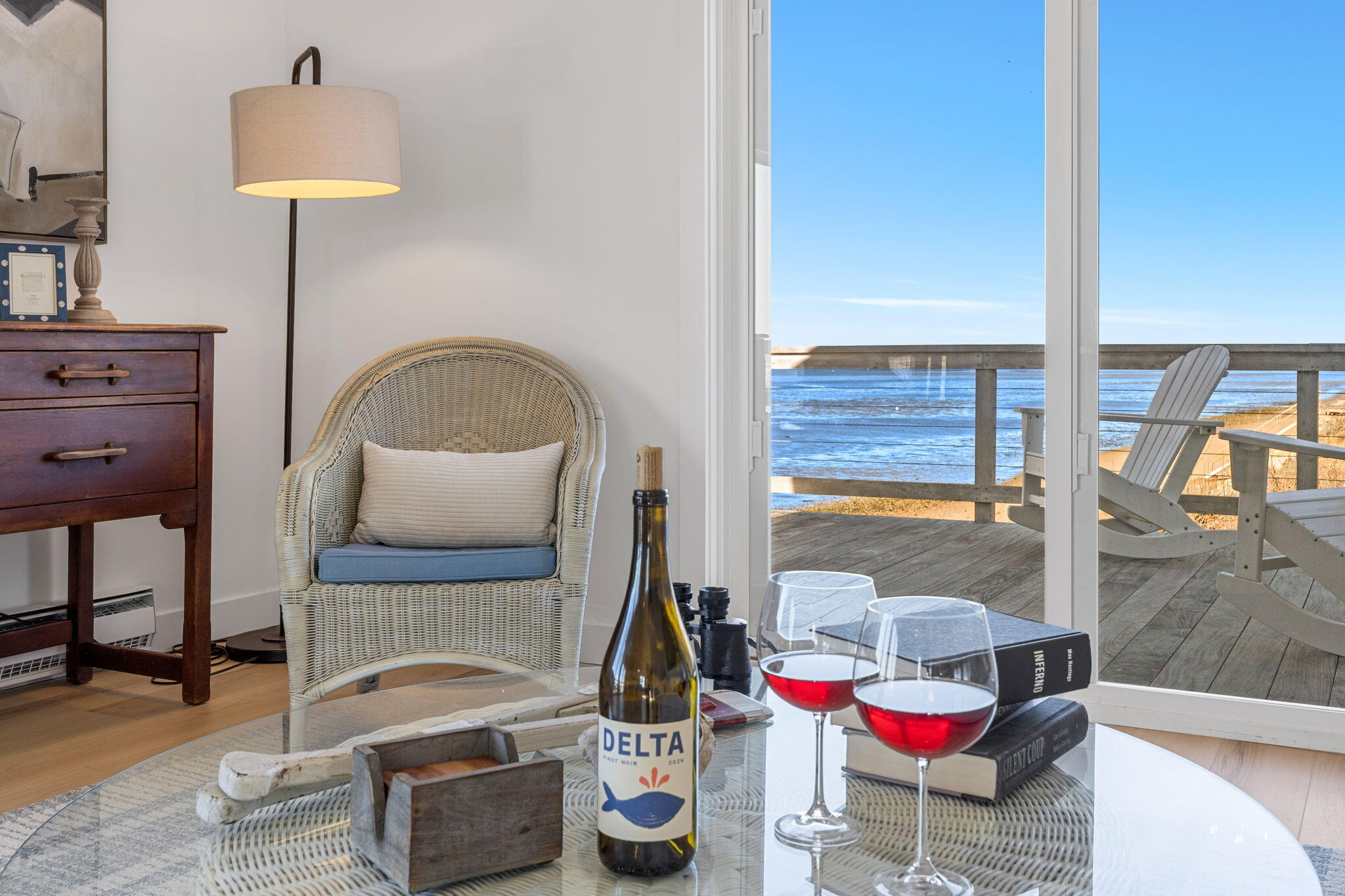 340 Salt Works Road Eastham, MA 02642 - Photo 15 of 52 a living room with a couch and a table