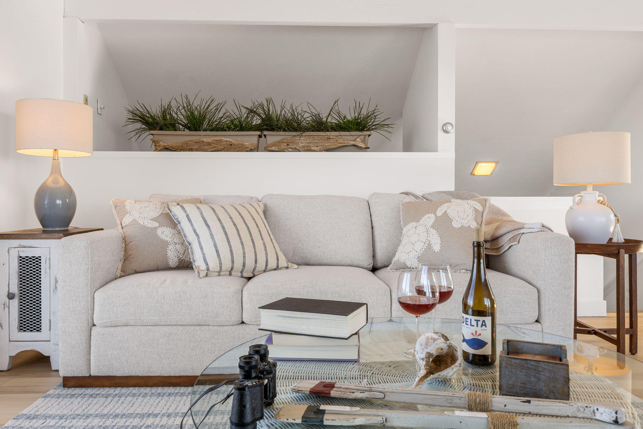 340 Salt Works Road Eastham, MA 02642 - Photo 16 of 52 a living room with furniture and a lamp