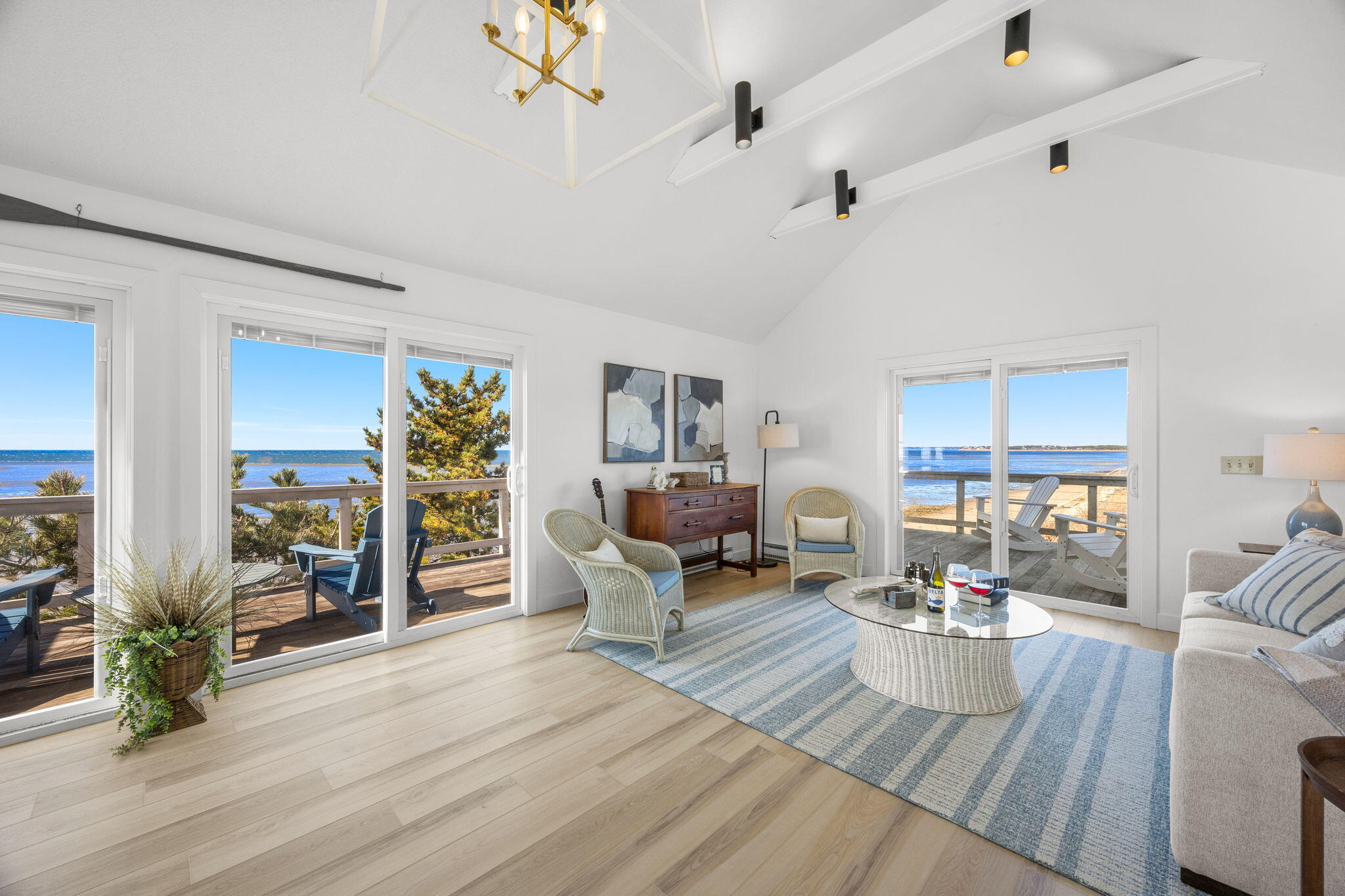 340 Salt Works Road Eastham, MA 02642 - Photo 17 of 52 a living room with furniture and wooden floor