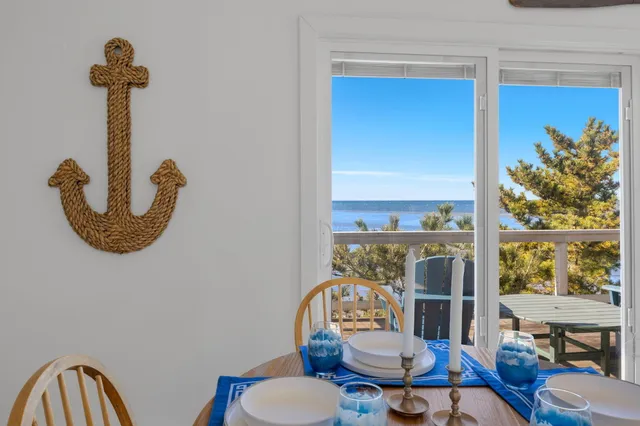 a bathroom with a sink mirror and toilet